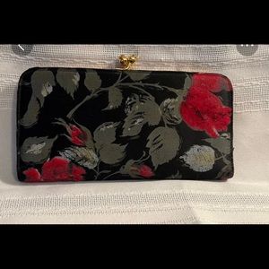 Wallet.. vintage by St. Thomas.. flocked red rose design on outside